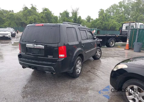 2010 Honda Pilot Touring из США, поврежденный, VIN 5FNYF4H91AB033801